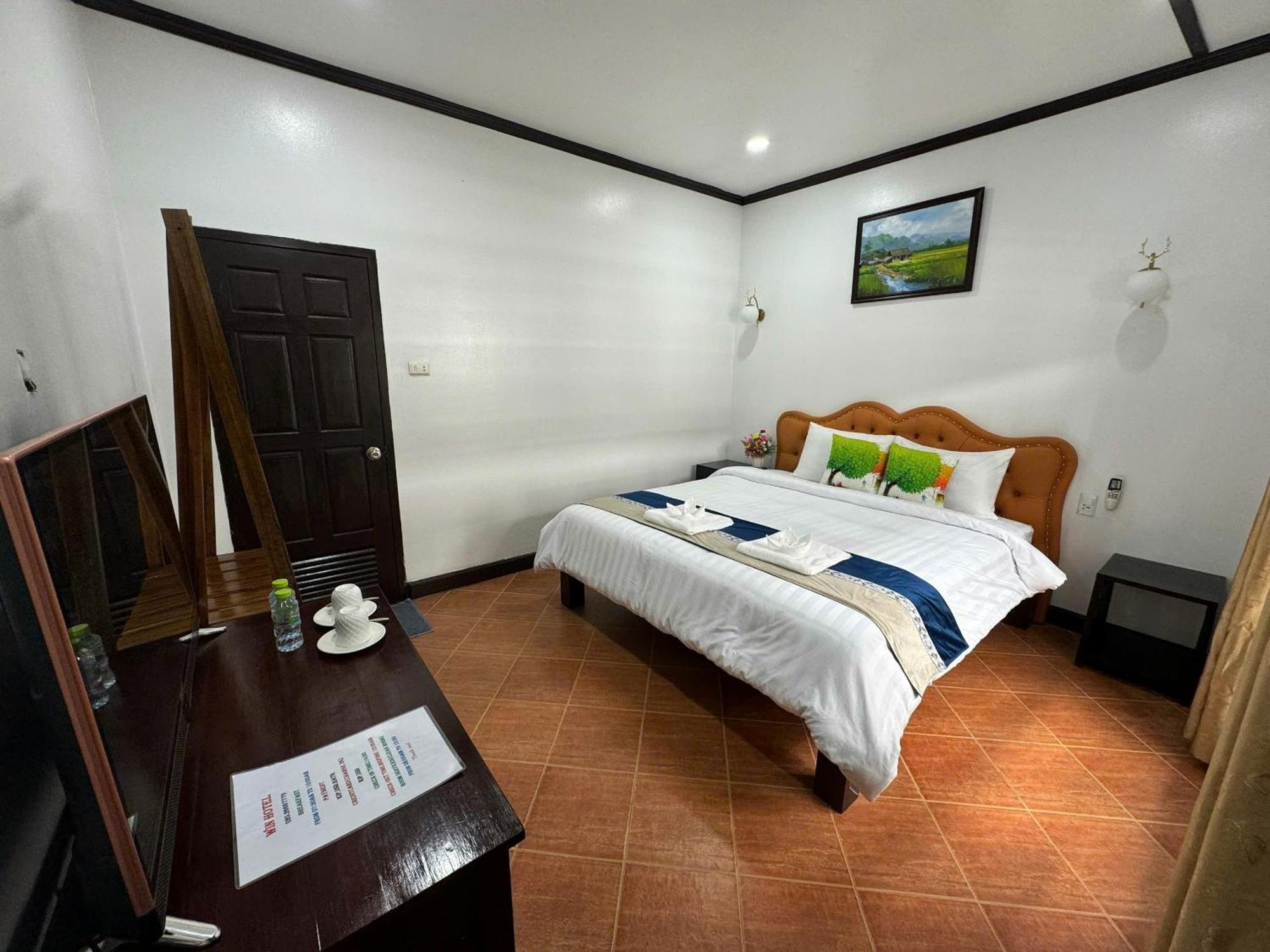 Win Hotel Vang Vieng Zimmer foto