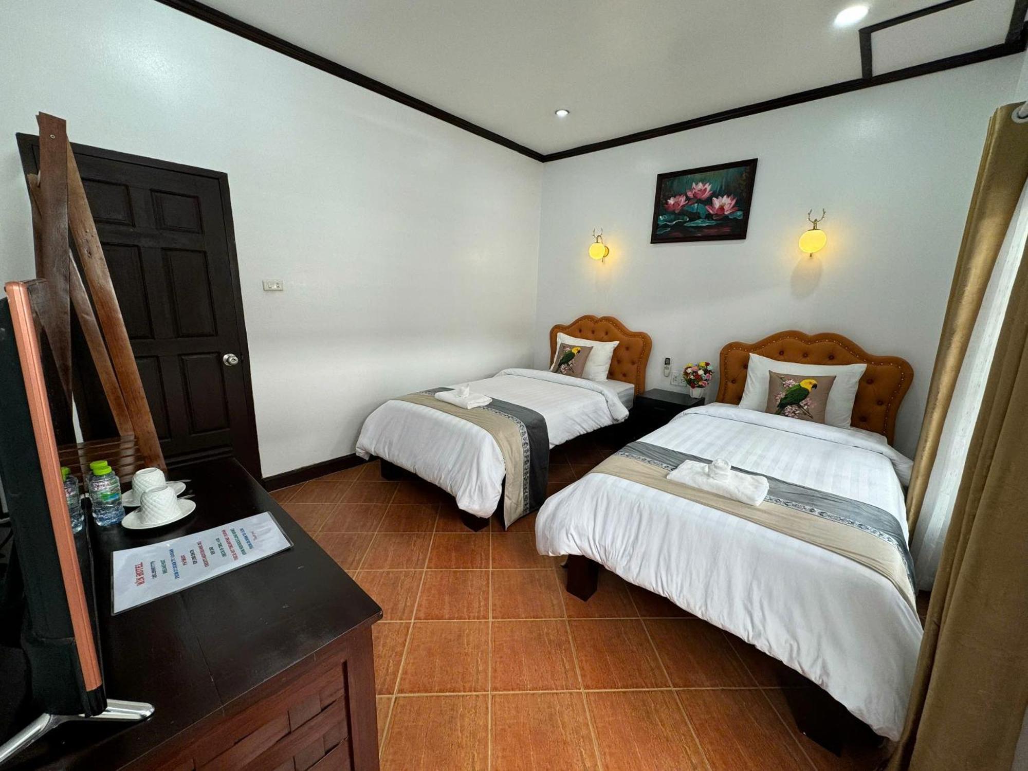 Win Hotel Vang Vieng Zimmer foto