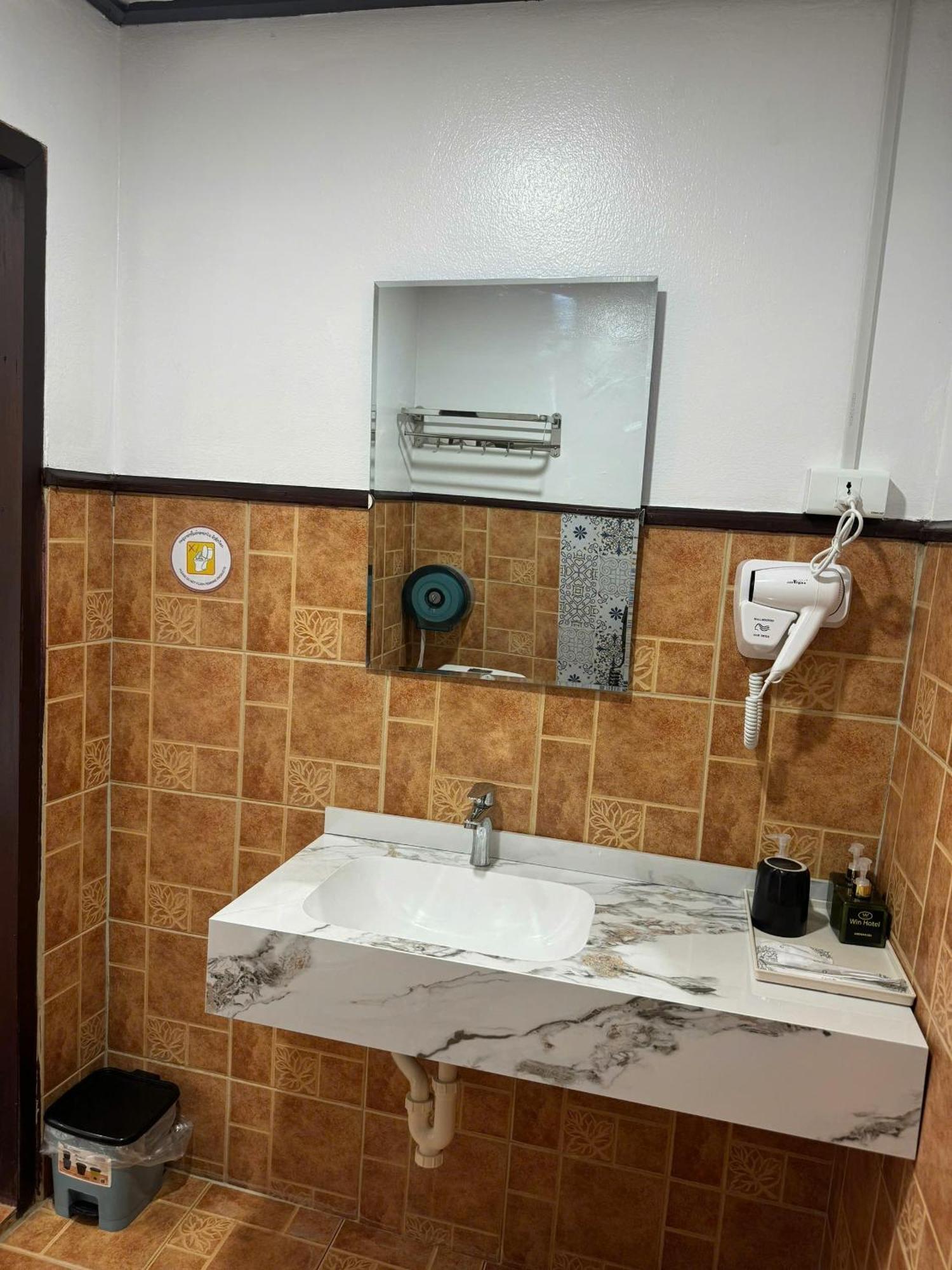Win Hotel Vang Vieng Zimmer foto